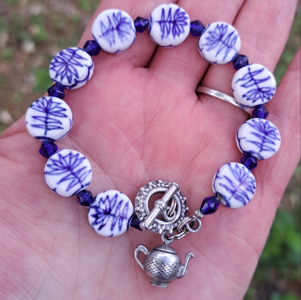 Blue and white ceramic beaded bracelet with teapot charm